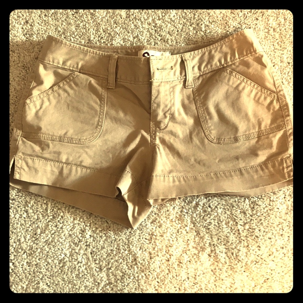 Tan SO short shorts.